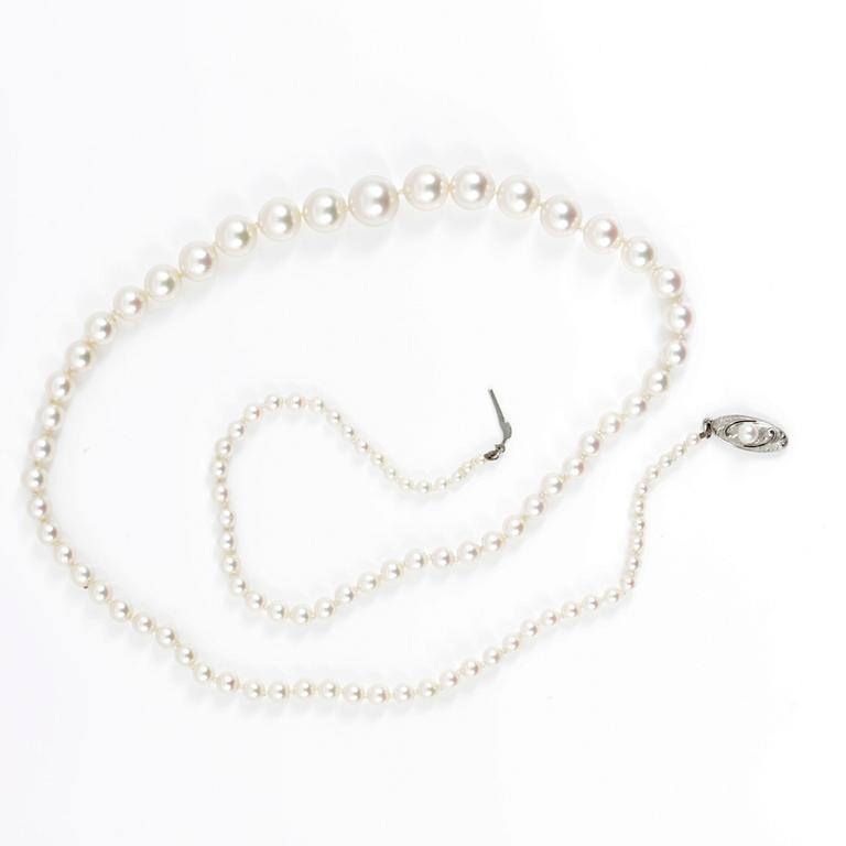 COLLIER,  odlade saltvattenspärlor, 14 K vitguld. 1900-talets första hälft.
