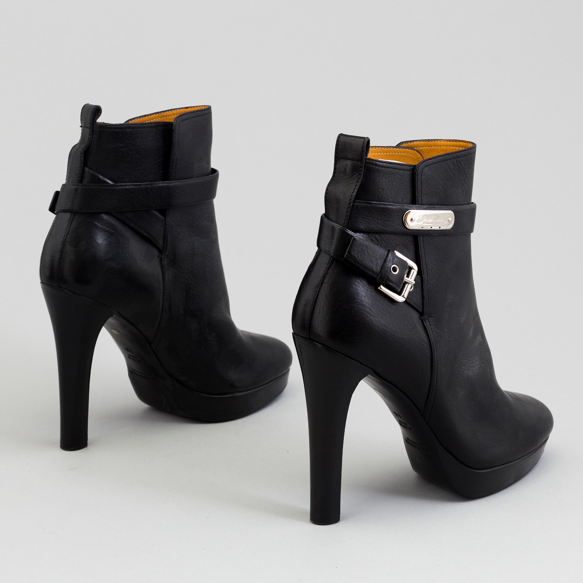 A pair of black leather bootie by Ralph Lauren.