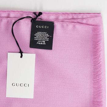 Gucci, a wool and silk mix "GG" jaquard shawl.