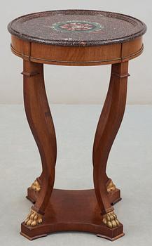 A Swedish 1830/40's porphyry table top. Later Empire-style mahogany veneer stand.