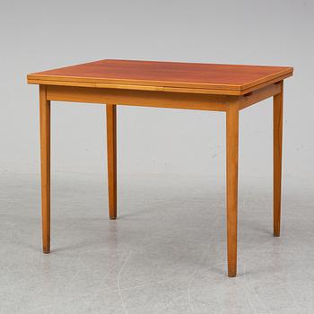 A 1950/60's teak dining table.