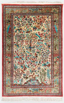 A silk Qum rug, central Persia, c. 210 x 138 cm.