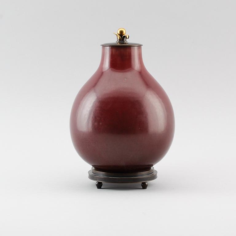 Carl Halier, & Knud Andersen, a stoneware and patinated bronze jar, lid and base, Royal Copenhagen, Denmark 1935.