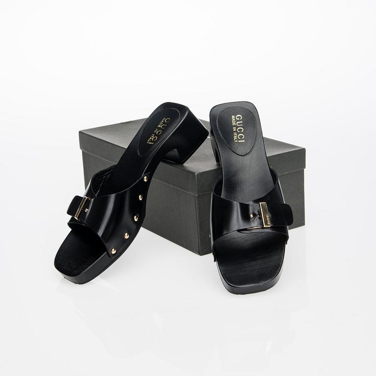 SKOR, Gucci.