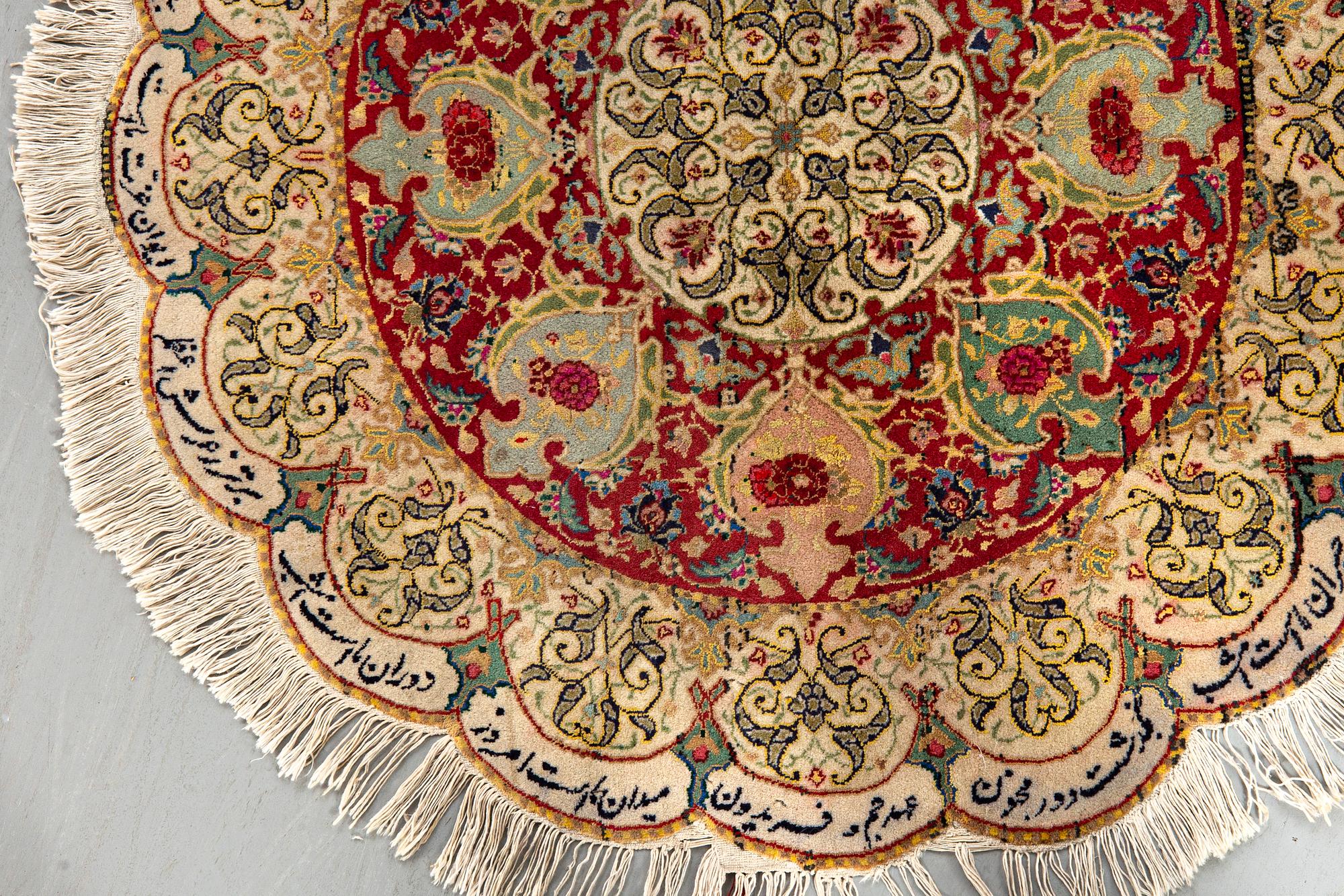 A semiantique Tabriz carpet diameter 95 cm.