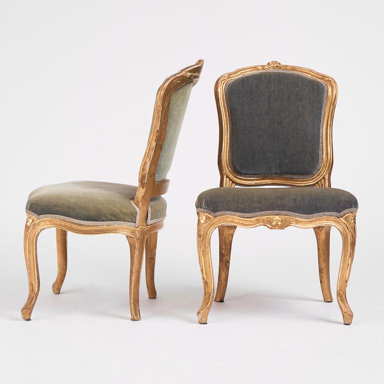 A pair of Swedish giltwood Rococo chairs, later part of the 18th century.