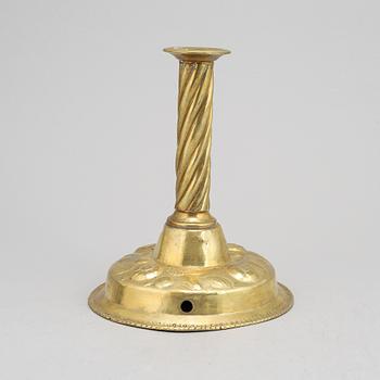 A 19th Century baroque style candlestick, with older parts.