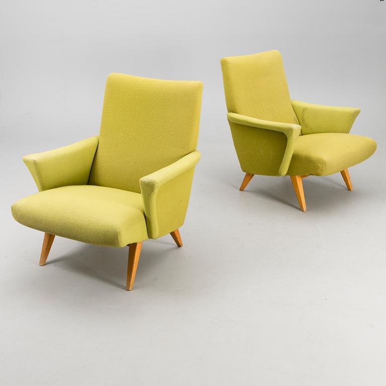 A pair of 1950s "Kolibri" armchairs for Moderno Oy, Finland.