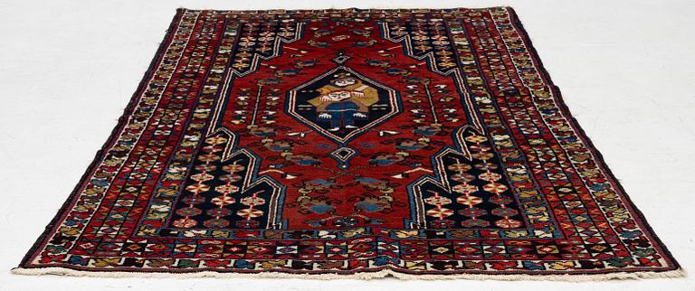 A semi-antique pictoral Mazlagan rug, Northwest Iran, c. 195 x 125 cm.