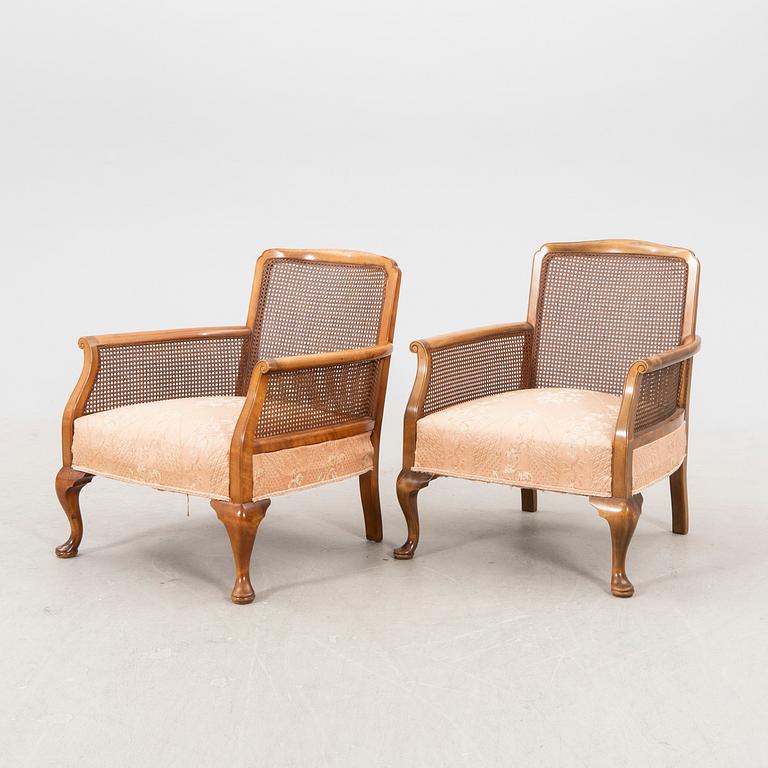 A pair of 1940/50s armchairs.