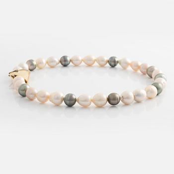 Ole Lynggaard lås 18K guld med en rund briljantslipad diamant.