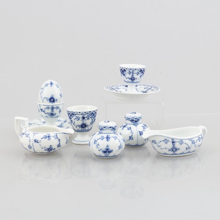 A group of three egg cups, a pair of salt/pepper shakers and two sauce boats, "Blue Fluted"/"Musselmalet", Royal Copenha.