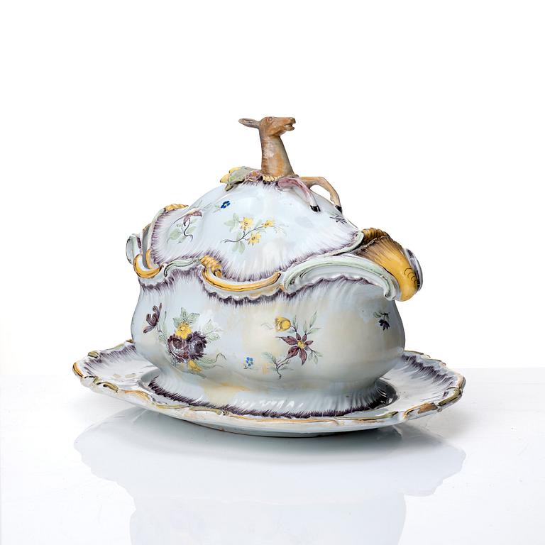 A Swedish Rörstrand faience tureen with cover and stand, 18th Century.