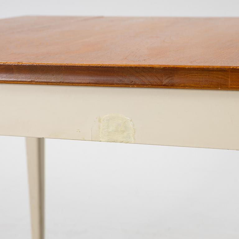 A dining table, mid-20th century.