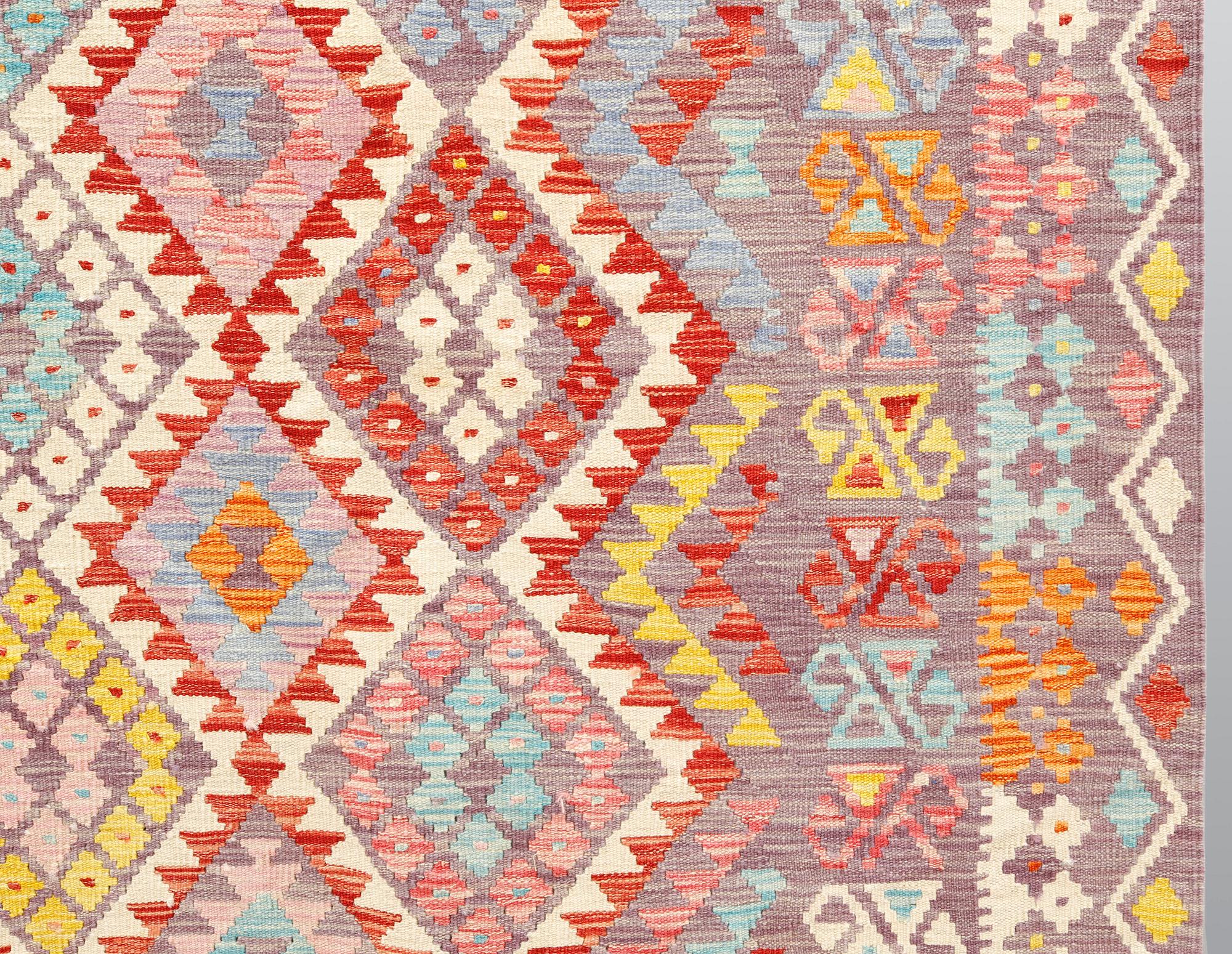 A kilim carpet ca 338 x 256 cm.