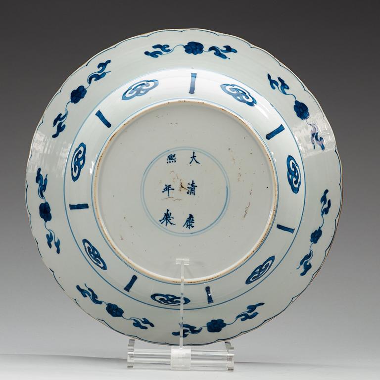 A blue and white dish, Qing dynasty, with Kangxi six character mark and period (1662-1722).