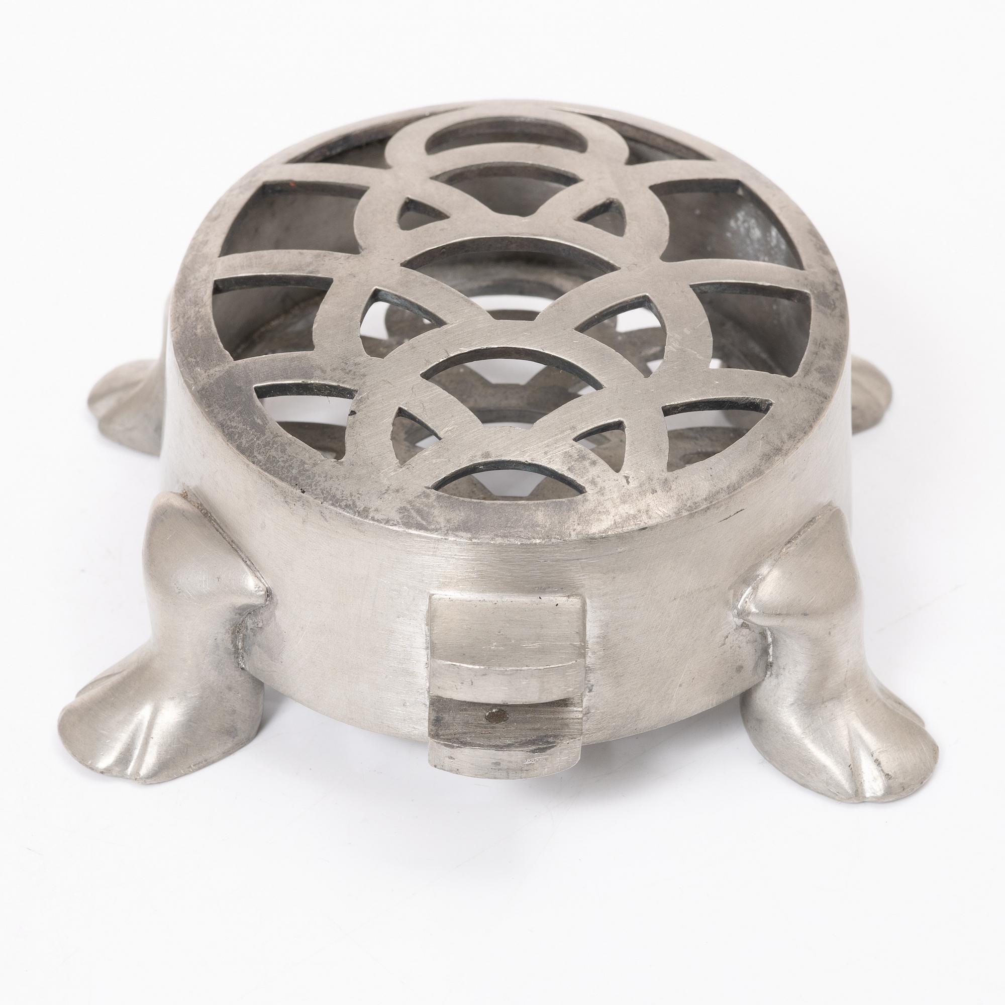 Firma Svenskt Tenn, a pewter flowerstand in the shape of a tortoise,  model no. A 1081, probably 1930s.