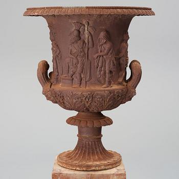 An around year 1900 iron garden Medici vase.