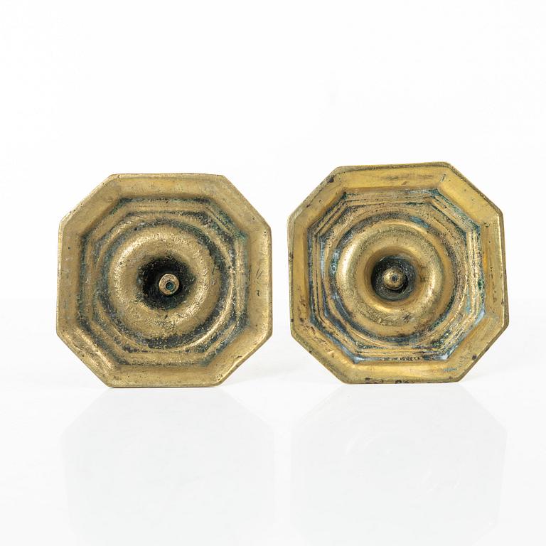 A set of two Northern European late baroque brass candlesticks, first part 18th century.
