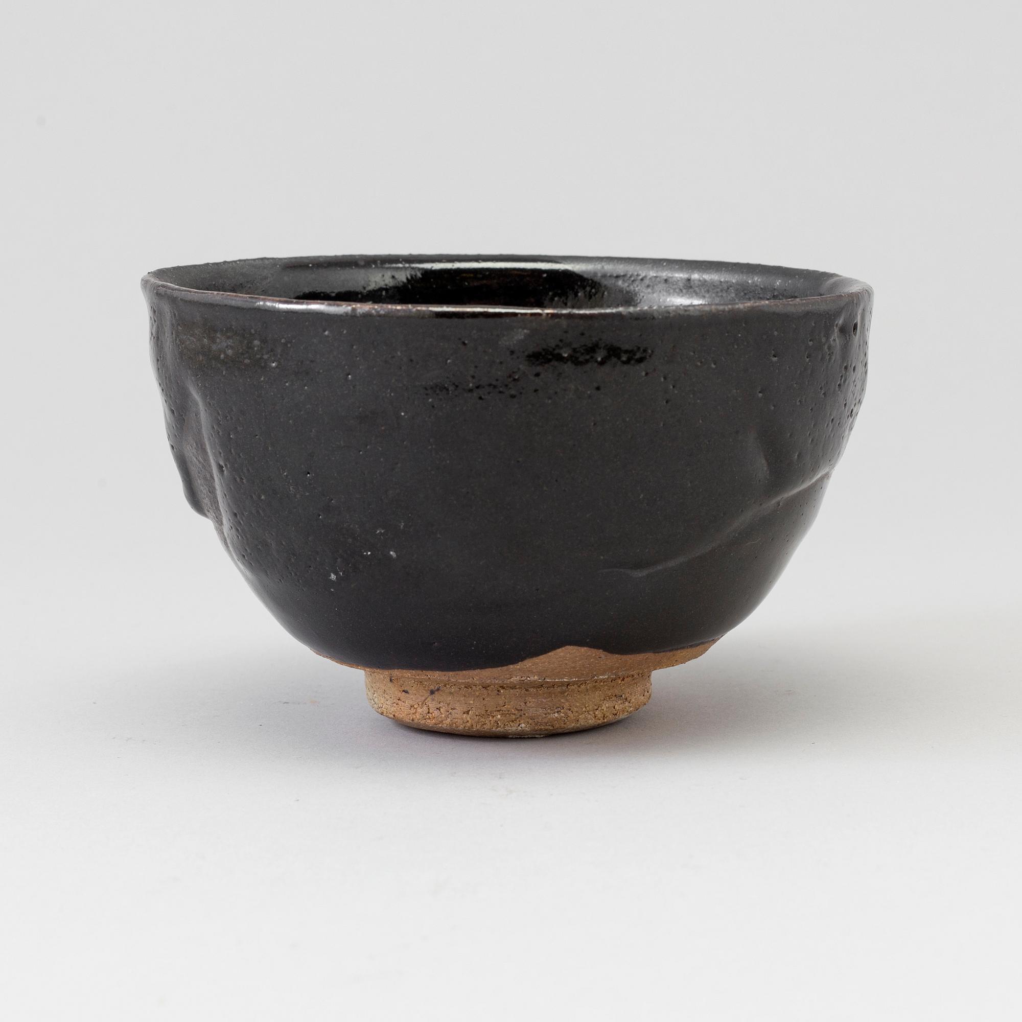 A Japanese Raku stoneware bowl, 20th century.