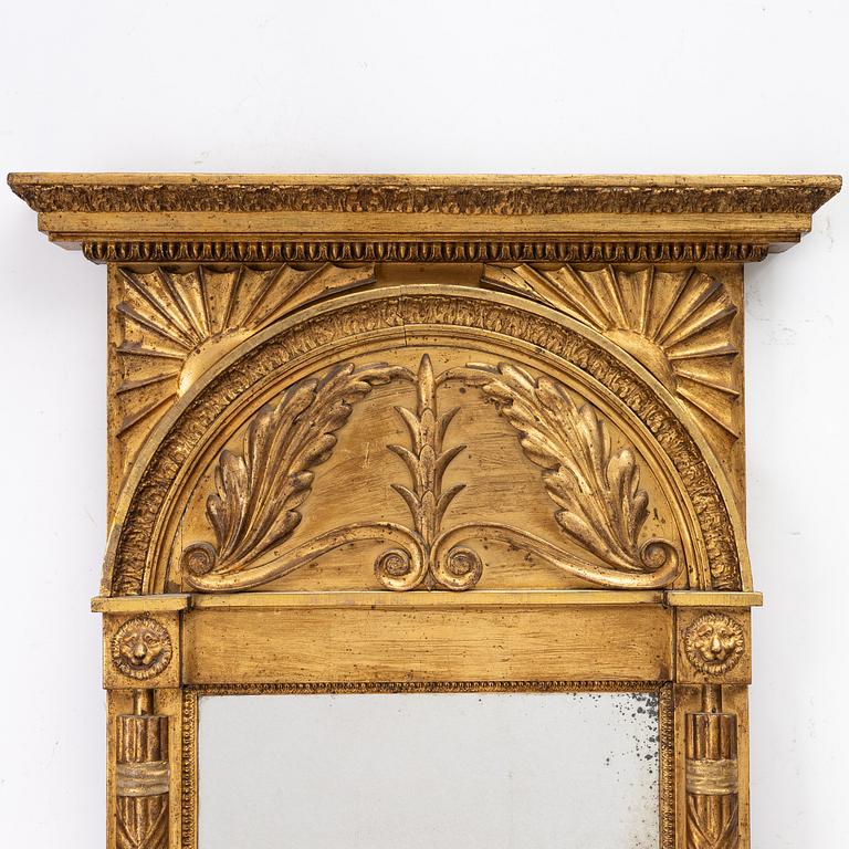 An Empire giltwood mirror by C. G. Hafström (master in Stockholm 1795-1815).