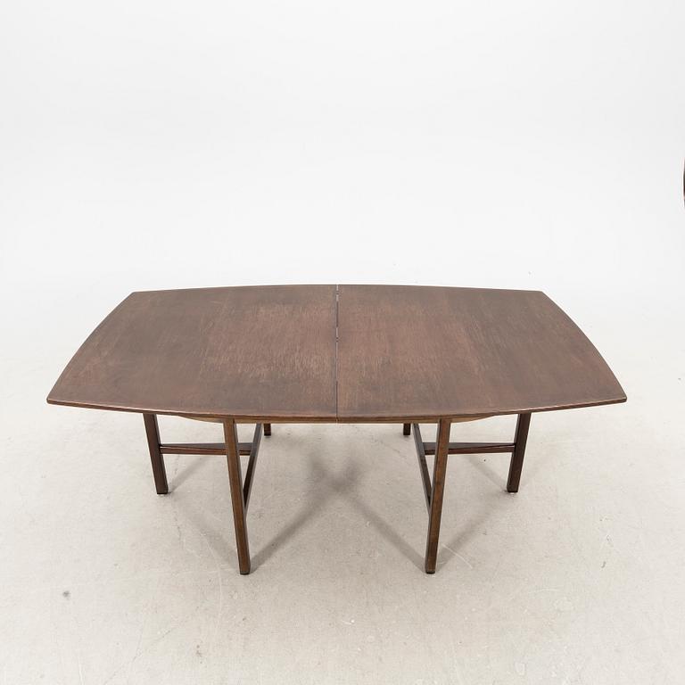 A table and four chairs in lacquered mahogany by David Rosén, "Triva-diné", middle of the 20th century.