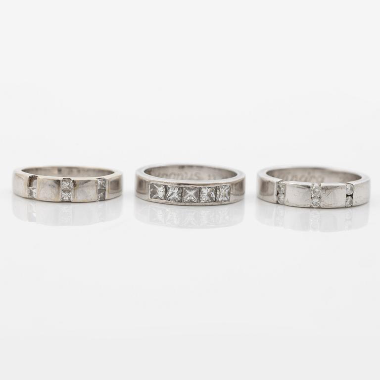 Three rings, 18K white gold with brilliant-cut and princess-cut diamonds.
