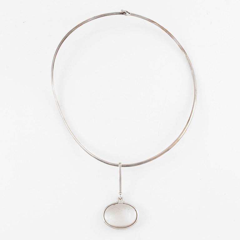 Vivianna Torun Bülow-Hübe, neck ring with pendant, sterling silver and rutilated quartz, contemporary.