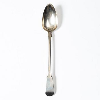 An English silver serving spoon, London 1815.