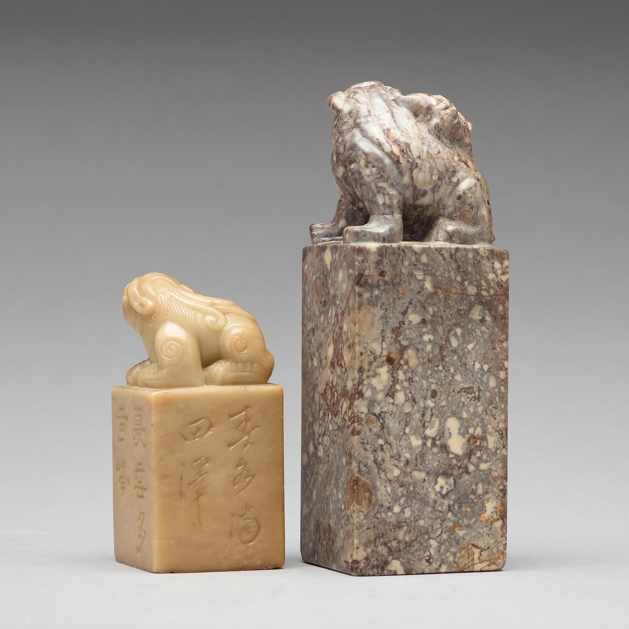 Two carved stone seals, circa 1900.