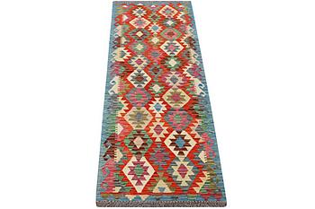 A runner carpet, Kilim, c. 292 x 82 cm.