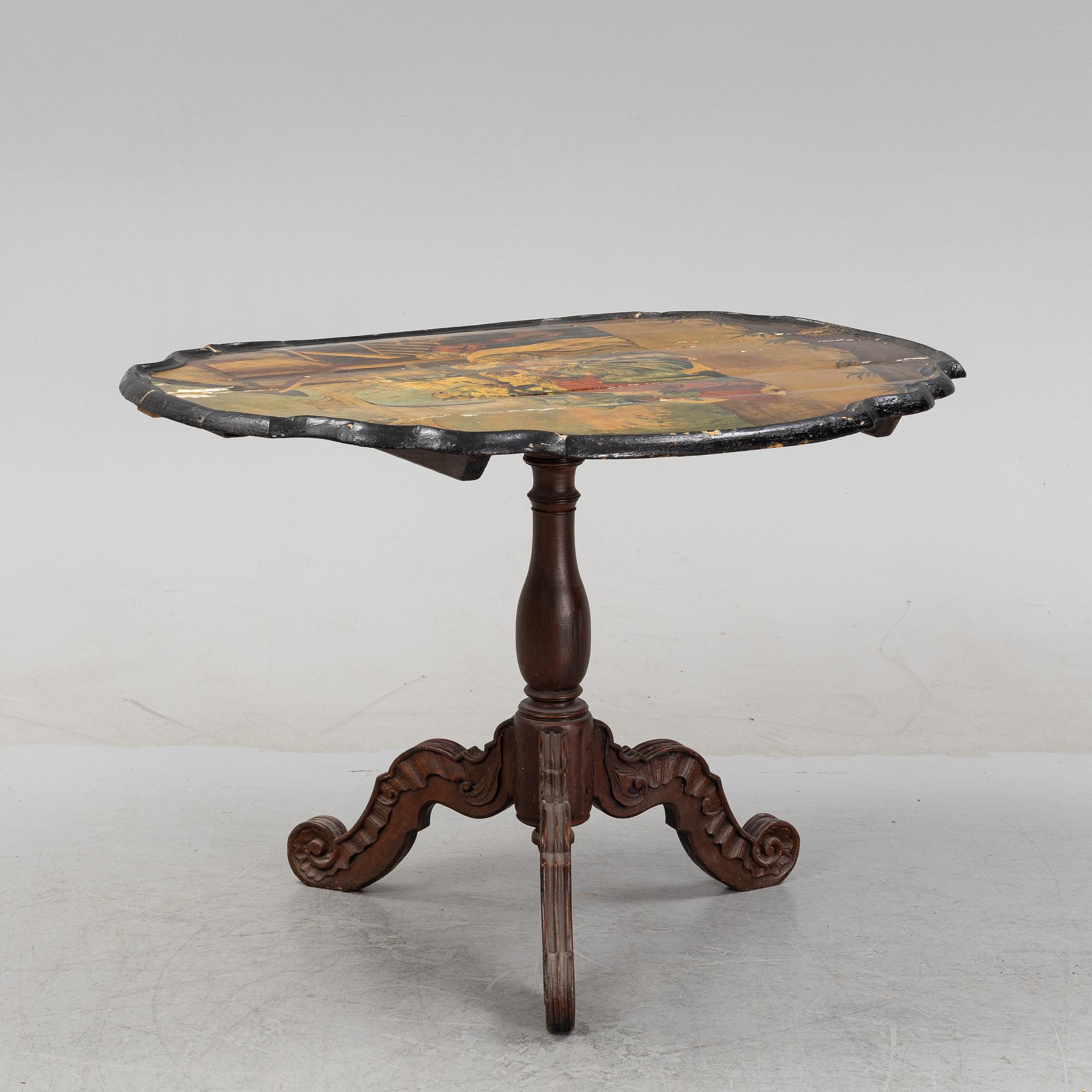 A transitional drop-leaf table, mid 18th Century.