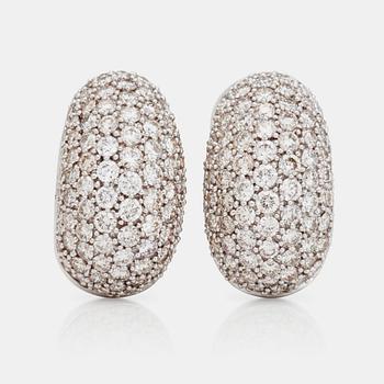 A pair of pavé-set brilliant-cut diamond, totally ca 3.5 cts, studs.