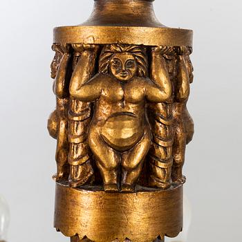 TAKLAMPA, 1900-talets mitt.