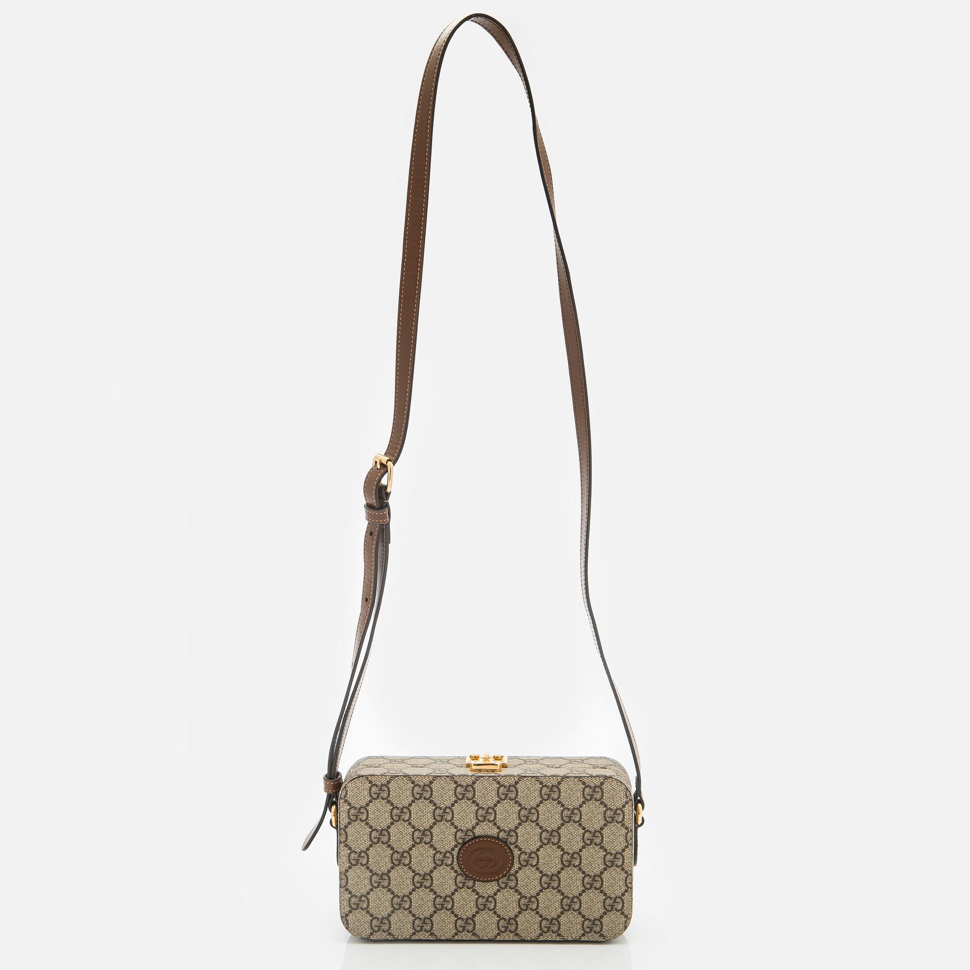Gucci, "GG Supreme" laukku.