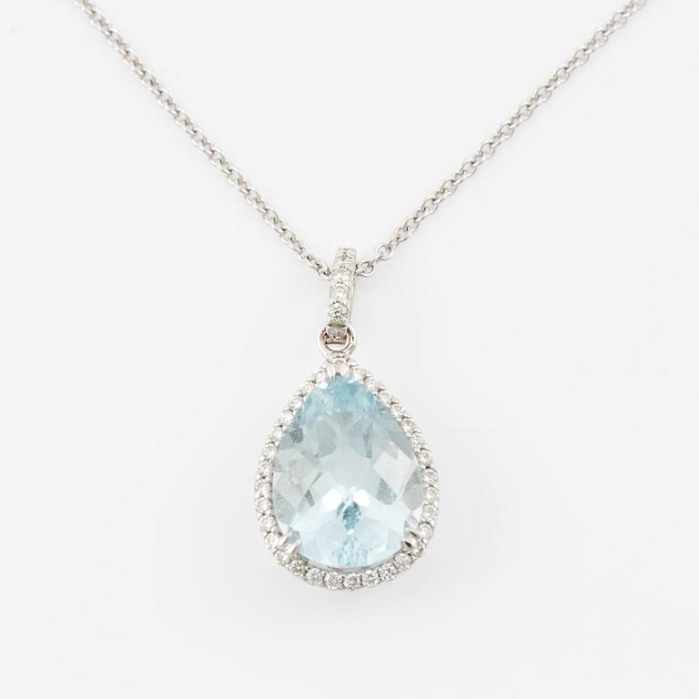 Pendant with chain in 18K white gold set with a faceted aquamarine and round brilliant-cut diamonds.