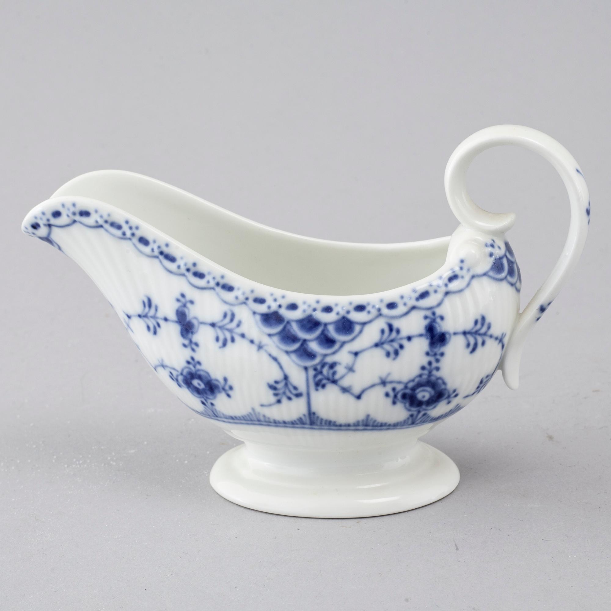 A porcelain tableware set of 69 pcs, "Musselmalet" by Royal Copenhagen, second half of the 20th century.