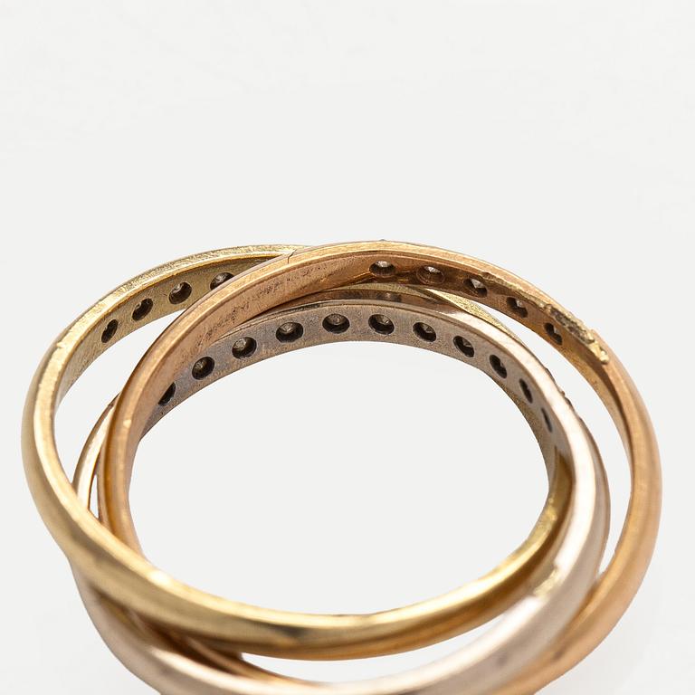 Sormus, 8/8 hiottuja timantteja, 18K kultaa kolmessa värissä. Kupittaan Kulta, Turku 1986.