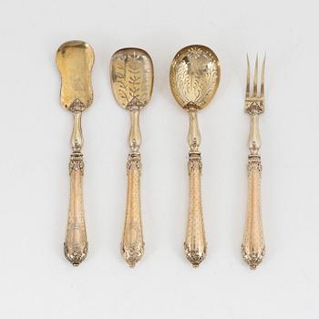 A set of four silver-gilt dessert cutlery, french export mark of Emile Huignard, late 19th century.