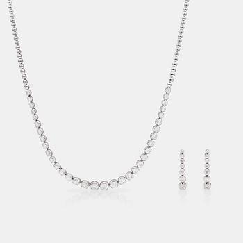 812. A line-necklace and matching earrings set with brilliant-cut diamonds.