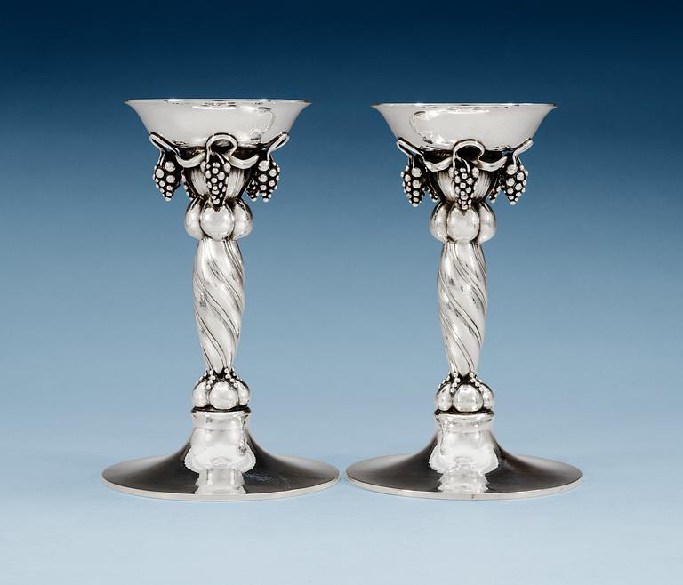 A pair of Georg Jensen sterling candlesticks, design nr 263B, Copenhagen 1945-77.