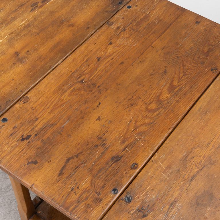An 19th century drop-leaf table.