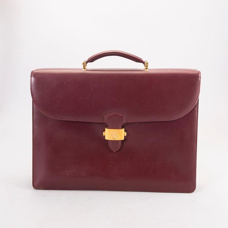 A Cartier leather briefcase.