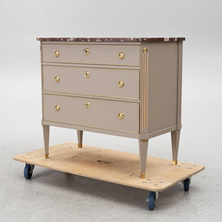 A Gustavian style chest of drawers, Mid 20th Century.
