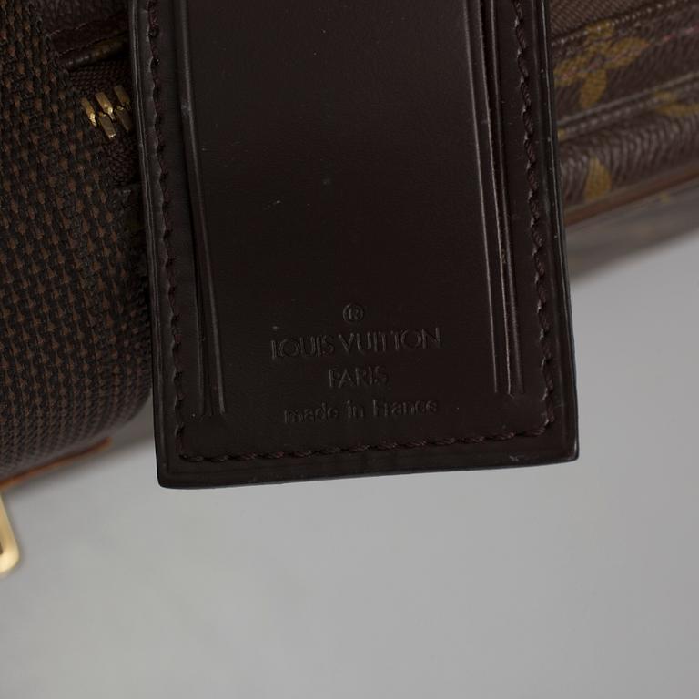 LOUIS VUITTON, a mongram canvas suitcase.