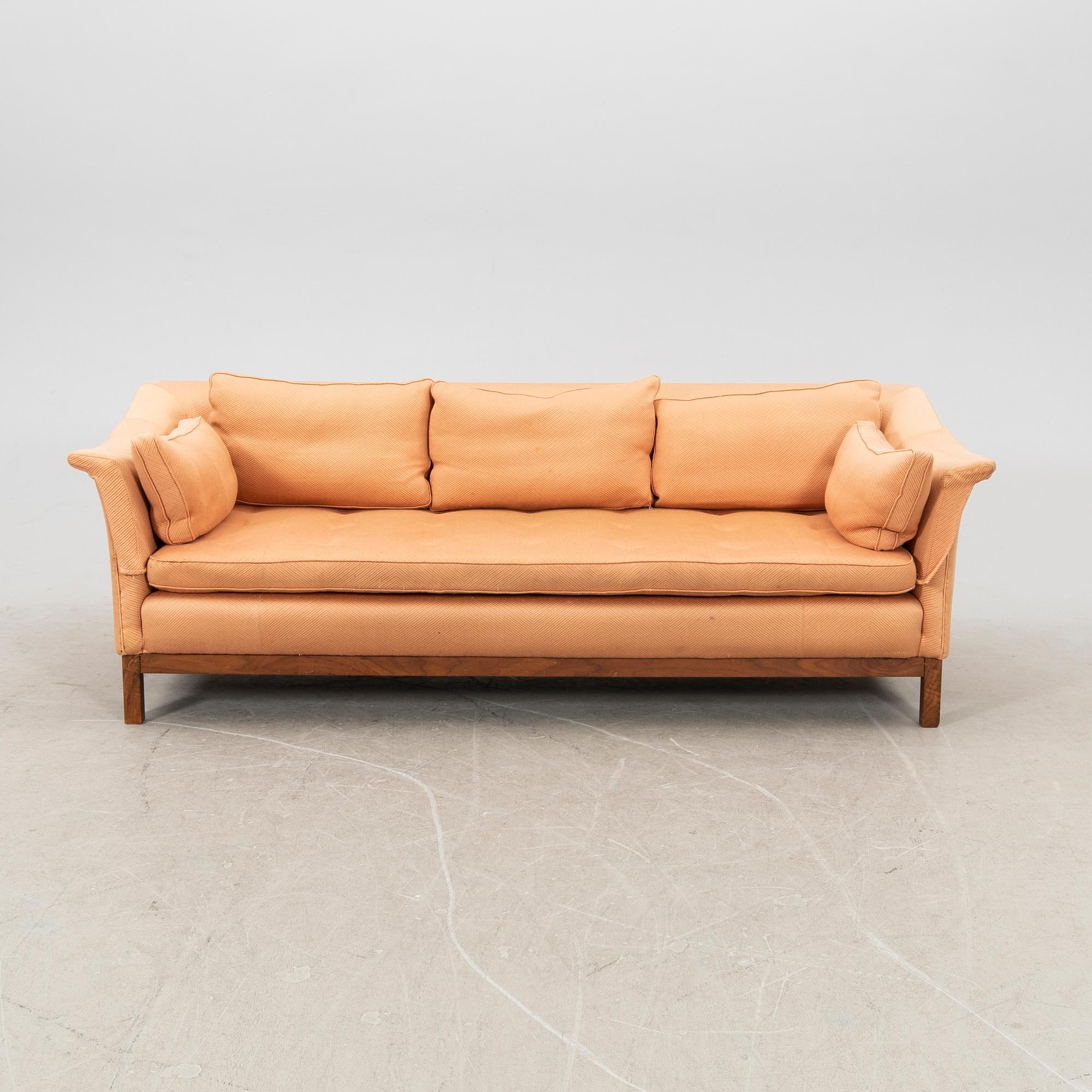 A 20th century three-seater sofa.