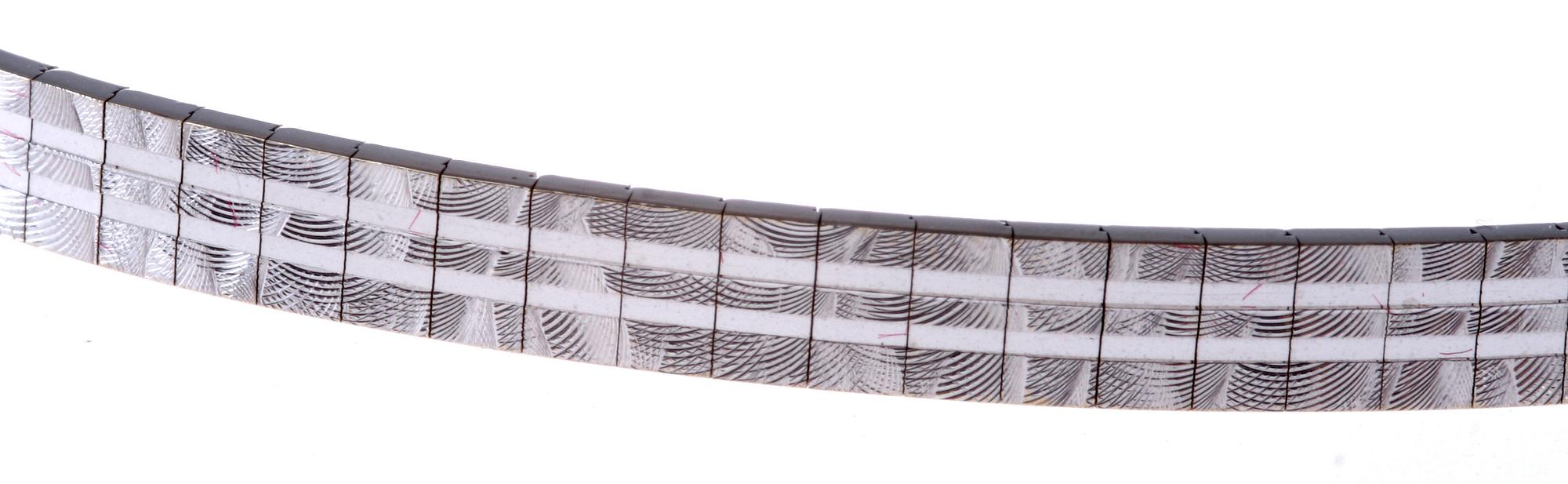 ARMBAND, vitguld, importstämplar. Vikt 15 gram.