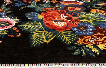 An Oriental rug, approx. 233 x 179 cm.