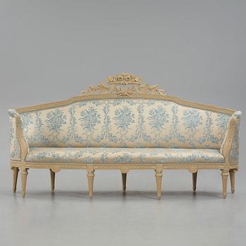 A grey-painted Gustavian 'canapé en corbeille'. sofa, later part of the 18th century.