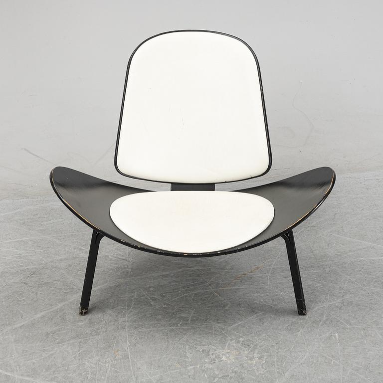 Hans J Wegner, a 'The Smiling Chair/CH07' easy chair from Carl Hansen & Søn, Odense, Denmark.